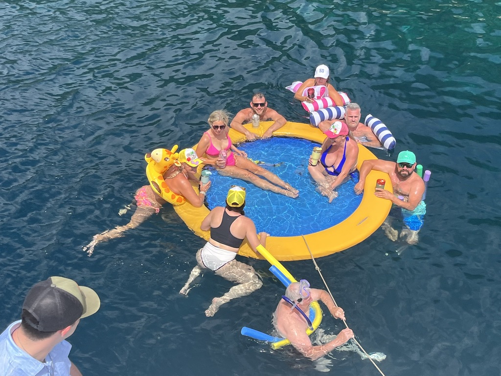 Guests in the floating pool on a private charter in St. Lucia
