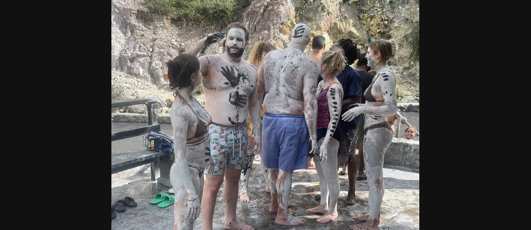 Guests enjoying the Sulphur Springs mud baths during a Soufriere land and sea adventure